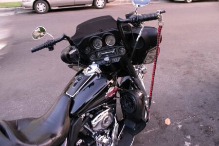 Manhattan, NY – Motorcyclist Injured in Car Collision at Madison St & St. James Place